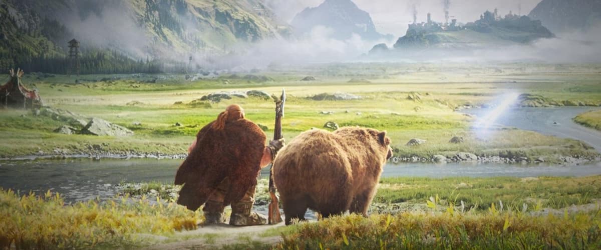 Un nain en manteau de fourrure et un ours brun contemplent une vallée verdoyante et brumeuse dans World of Warcraft: Forever