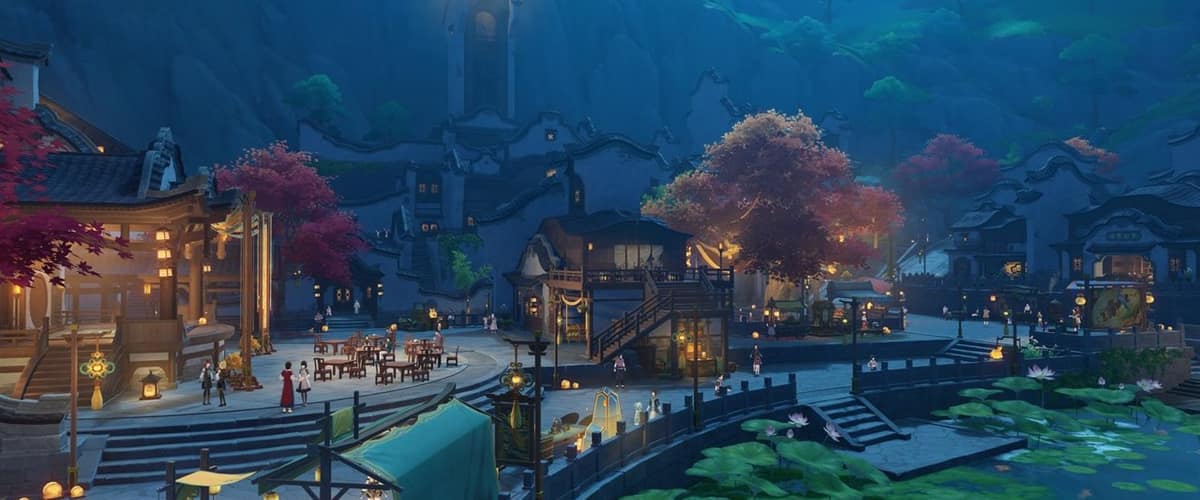 Une ville aux toits courbes et aux lanternes allumées, au bord d'un bassin couvert de lotus, sous une falaise et une tour éclairée, la nuit, dans Genshin Impact