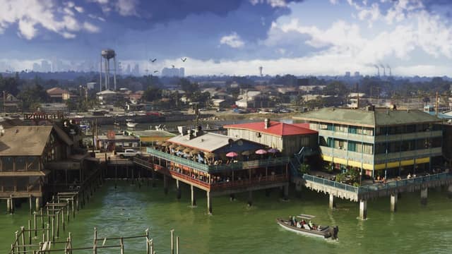 Restaurants et maisons sur pilotis au bord de l'eau à Grassrivers, un bateau au premier plan