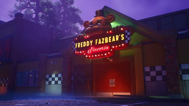 La façade de la pizzeria Freddy Fazbear's, la nuit, sur l'île de Fortnite pendant Fortnitemares