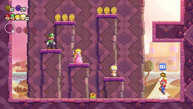 Luigi, Peach et Toad sur des plateformes et Mario en plein saut, dans un décor de briques roses, dans Super Mario Bros. Wonder