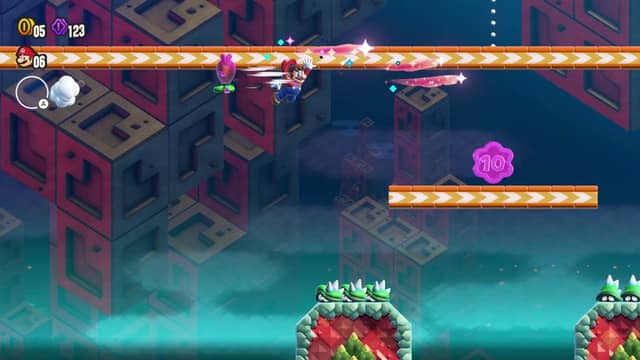 Mario file le long d'une passerelle dans un niveau aux blocs violets et turquoise de Super Mario Bros. Wonder