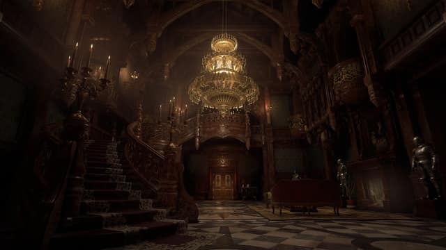 Le grand hall d'un château avec lustre doré, escalier et armures dans Resident Evil Village