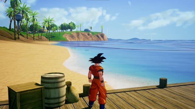 Goku, de dos, sur un ponton en bois face à une plage et à la mer