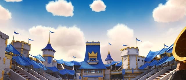 L'arène de Clash Royale et ses tours bleues sous un ciel nuageux