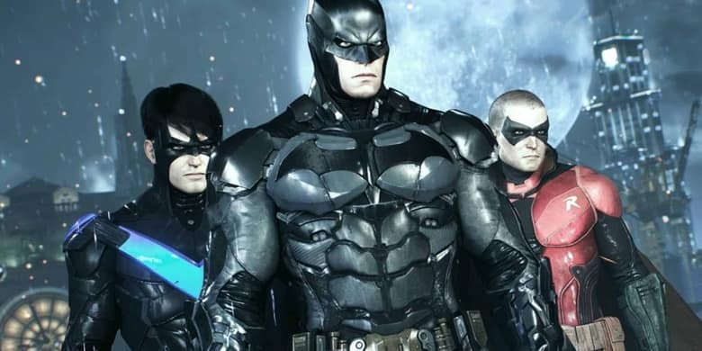 Batman Arkham Knight : Batman entouré de Nightwing et Robin devant les gratte-ciel de Gotham