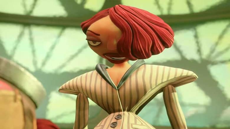 Psychonauts 2 : un personnage en papier découpé, coiffure rousse, sur fond vert