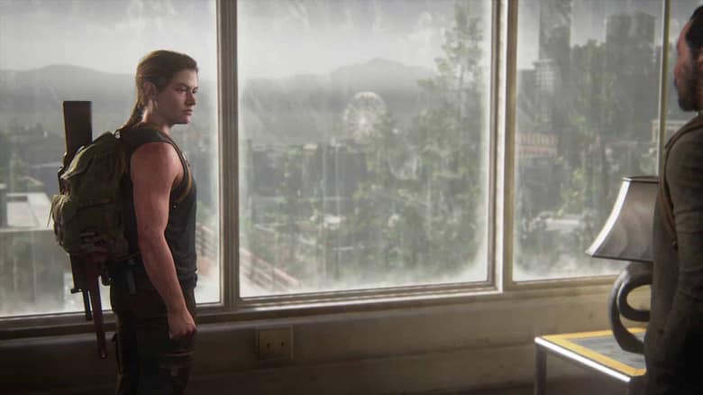 The Last of Us Part II : Ellie regarde la ville par une baie vitrée