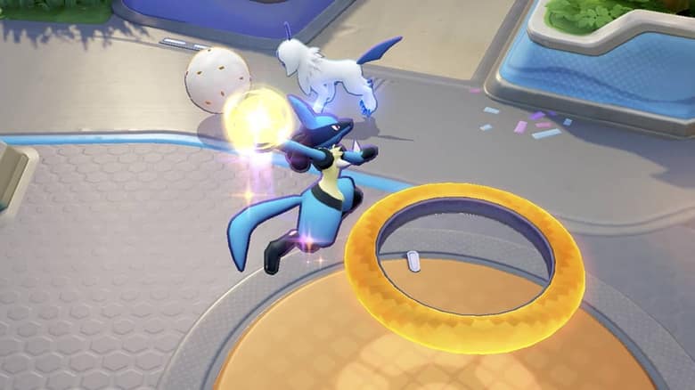 Lucario saute vers une zone de but orange entourée d'un anneau jaune, Absol derrière lui
