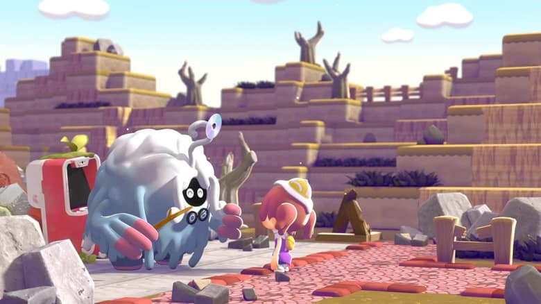 Le Professeur Bouldeneu, grand Pokémon couvert de lianes bleues, parle au joueur au milieu d'un village en ruine