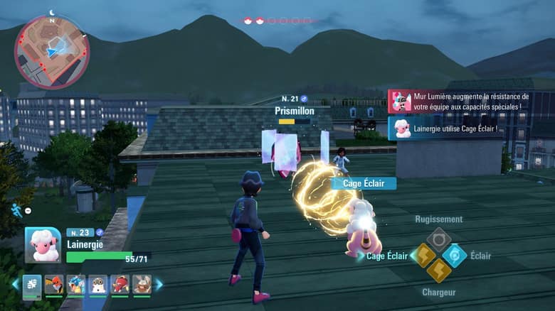 Combat de nuit sur un toit : Lainergie lance Cage Éclair sur un Prismillon, avec les quatre capacités et leur recharge affichées en bas à droite