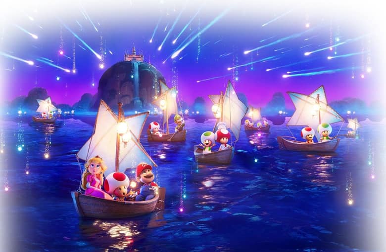 Peach, Toad et Mario dans une barque à voile en forme d'étoile, entourés d'autres barques de Toad, sous une pluie de comètes au-dessus du château de Peach