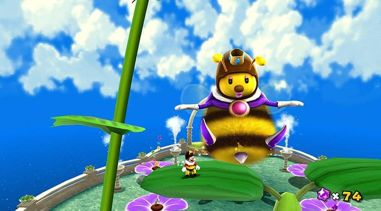 Mario abeille face à la reine des abeilles, sur une planète couverte de fleurs
