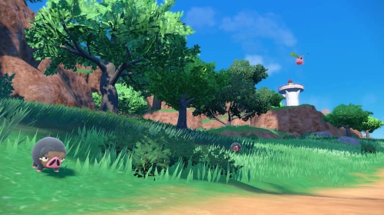 Paysage de Paldea avec des arbres, des collines et un phare au loin, et un Pokémon dans l'herbe
