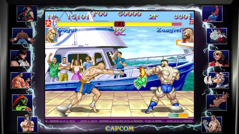 Écran de Street Fighter II dans la compilation 30th Anniversary Collection : Sagat affronte Zangief sur le pont d'un bateau