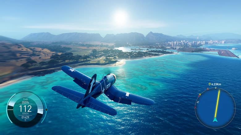 Un avion de chasse bleu à hélice survole la mer turquoise le long de la côte d'O'ahu