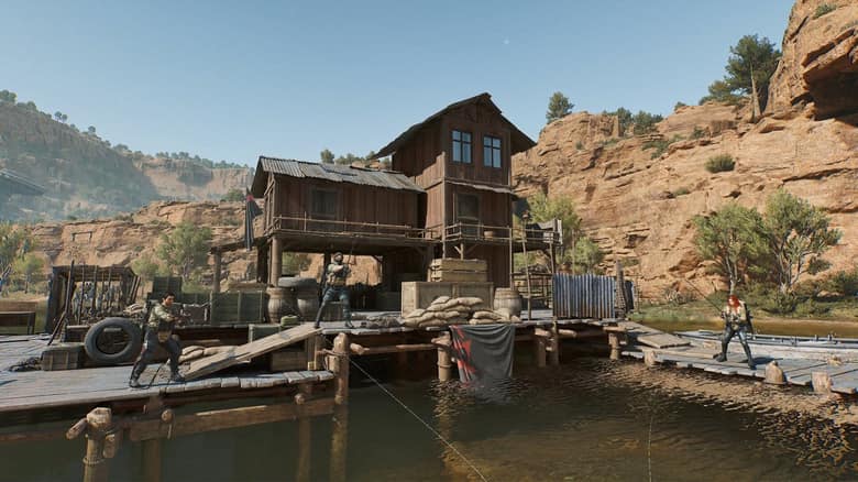 Petit port de pêche au pied de falaises rouges dans une carte du mode Opérations de Delta Force