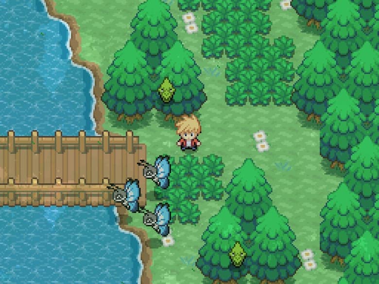 Route de Project Vanguard : un dresseur blond près d'un pont en bois, au bord d'une rivière, entouré de Pokémon