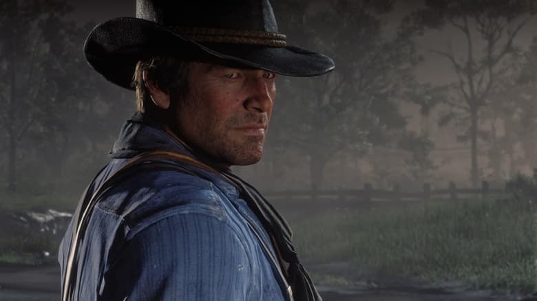 Arthur Morgan, chapeau sur la tête, dans une scène de Red Dead Redemption 2