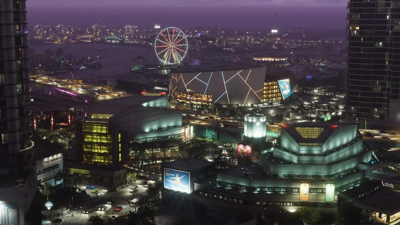 Vice City de nuit vue d'en haut, avec une grande roue illuminée, dans GTA VI