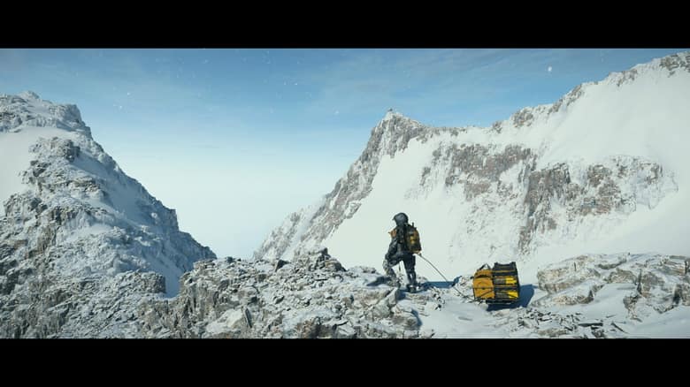 Capture officielle de Death Stranding 2 : un porteur et sa cargaison dans des montagnes enneigées